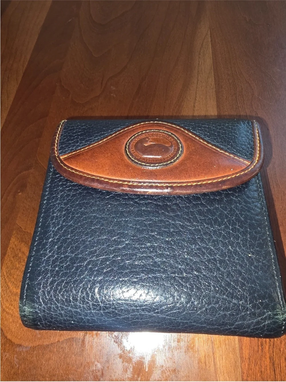 Dooney & Bourke Black and Brown Leather Bi-Fold Wallet vintage.